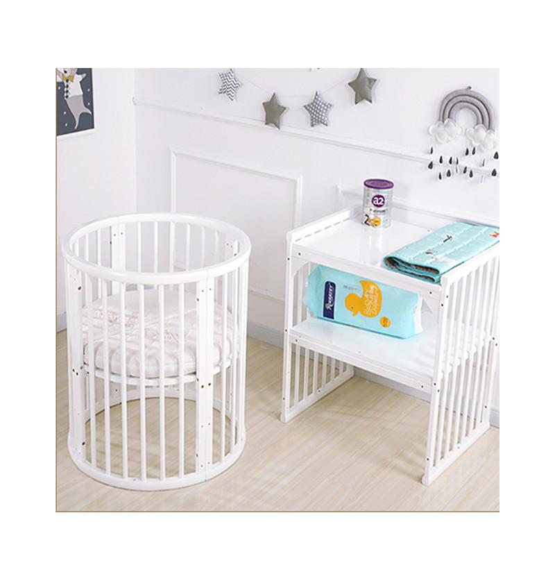 crib rocker for newborn use it as small round baby bed with a side diaper changing station and essential storage table