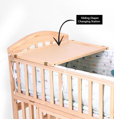 natural crib for baby with inbuilt diaper changing station