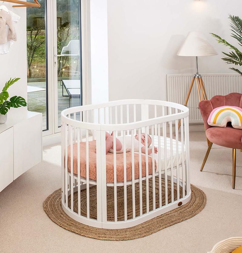 cribs and cradles looks beautiful when placed over a mat or given a dedicated space
