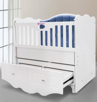modern crib that swings manualli with two drawers