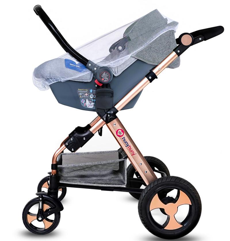 Golden_frame_stroller_with_mosquito_net_covered_car_seat